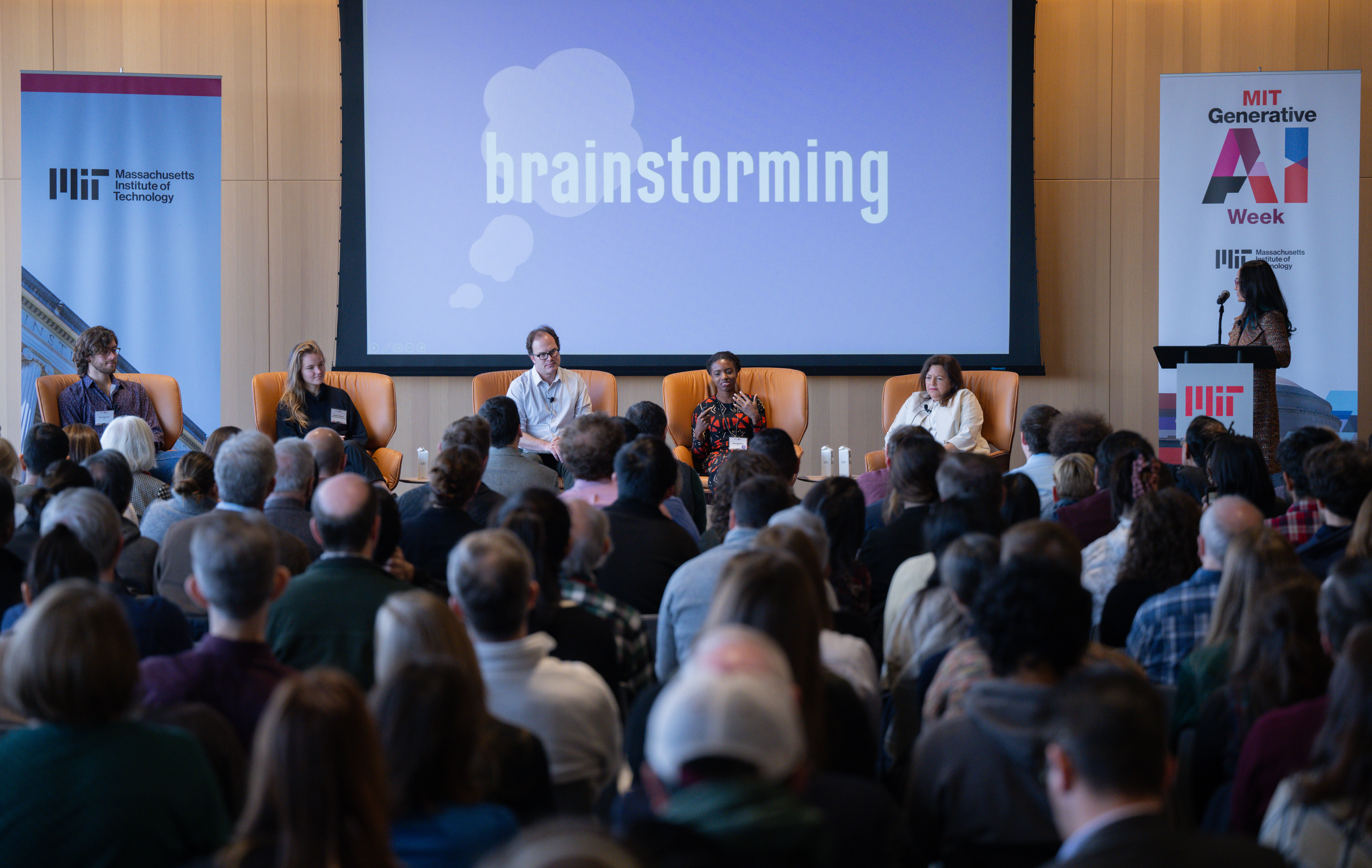 MIT Open Learning's Cynthia Breazeal moderates a panel on reinvent education through the use of GenAI.