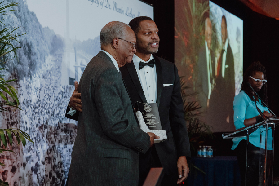 Clarence Williams and Karl Reid on stage.