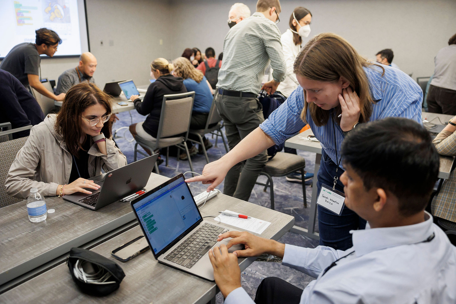 Attendees learn how to use AI tools during a breakout session.